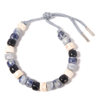 El Sodalite Howlite goteó la pulsera 13.5g con el cordón de plata trenzado