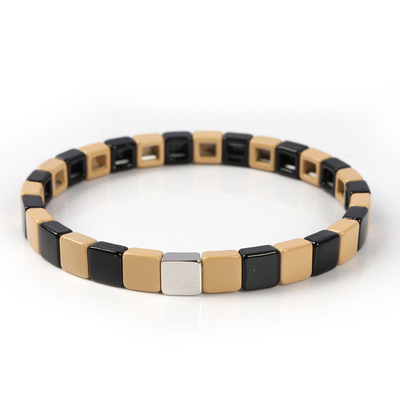 La pulsera geométrica de la teja del esmalte, estiramiento multicolor goteó las pulseras