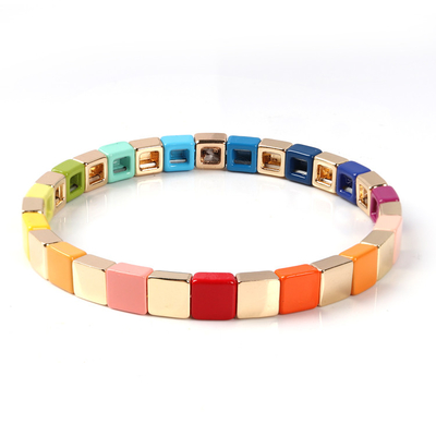 La pulsera geométrica de la teja del esmalte, estiramiento multicolor goteó las pulseras