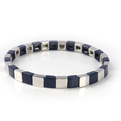 La pulsera geométrica de la teja del esmalte, estiramiento multicolor goteó las pulseras