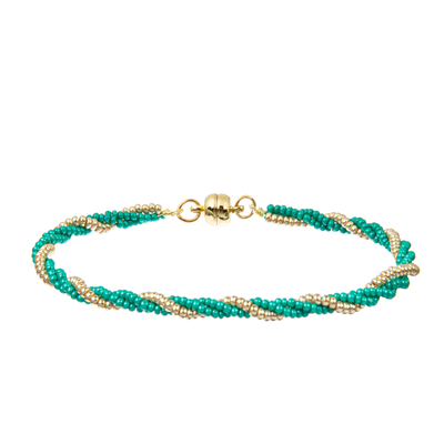 Los sistemas moldeados multi elásticos de las pulseras, semilla de plata verde gotean las pulseras