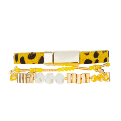 El cristal de la joyería del kc gotea la pila de cuero de la pulsera fijó la colección amarilla del leopardo
