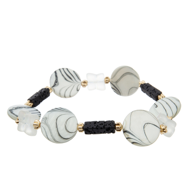 Pulseras hechas a mano de las gotas del espaciador de la flor del oro atadas con Lava Beads natural
