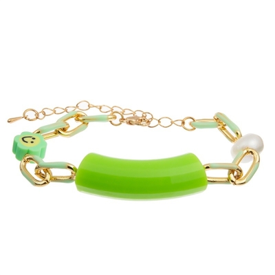 La barra de bambú gotea la pulsera hecha a mano de la cadena del oro colorida para el Día de la Independencia