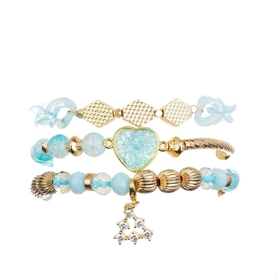 El metal de cadena azul del oro de Plactic gotea la pulsera hecha a mano para las mujeres va de fiesta