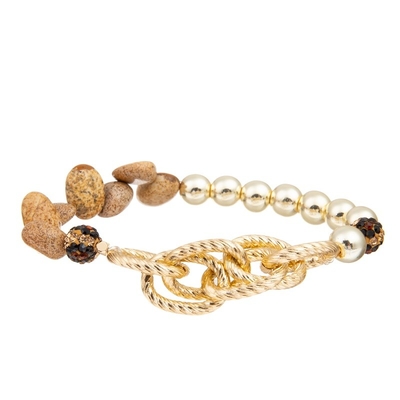 El oro de la piedra de la imagen gotea el elástico moldeado hecho a mano de la pulsera para la colección de la primavera